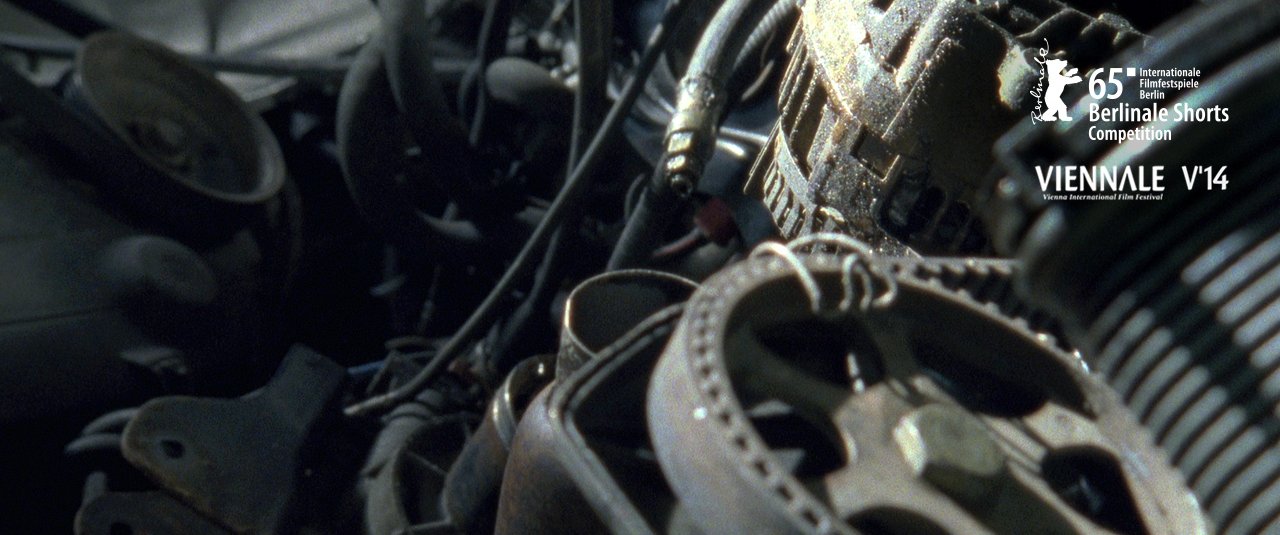 <div class='slide_cap'><div class='sw_hg'><h1>Of Stains, Scrap & Tires</h1><br><h2>Experimental Film, 2014</h2></div><a class='no_visible' href='/en/projects/2015_01_20_of_stains_scrap_and_tires/#slide'></a></div>